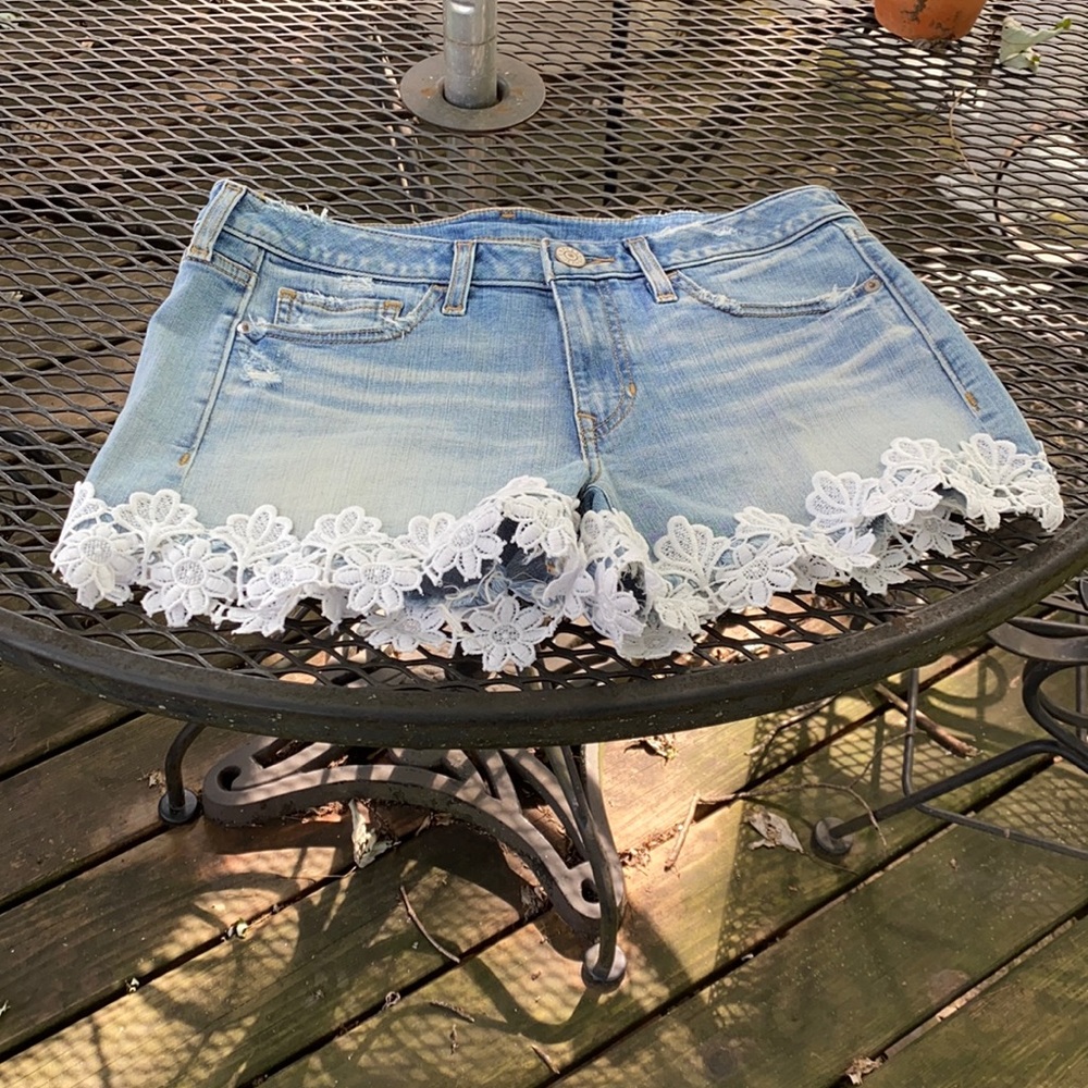 Express distressed shorts with lace hem